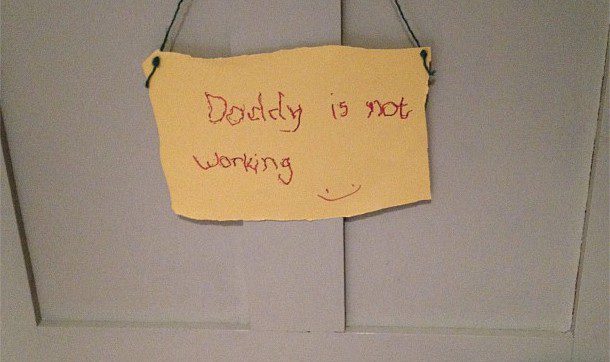 Sign on my office door that says 'Daddy is not working' with a smiley face