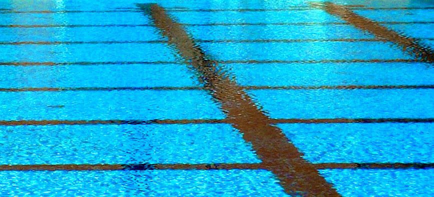 Photograph of a swimming pool with grid lines beneath the surface.
