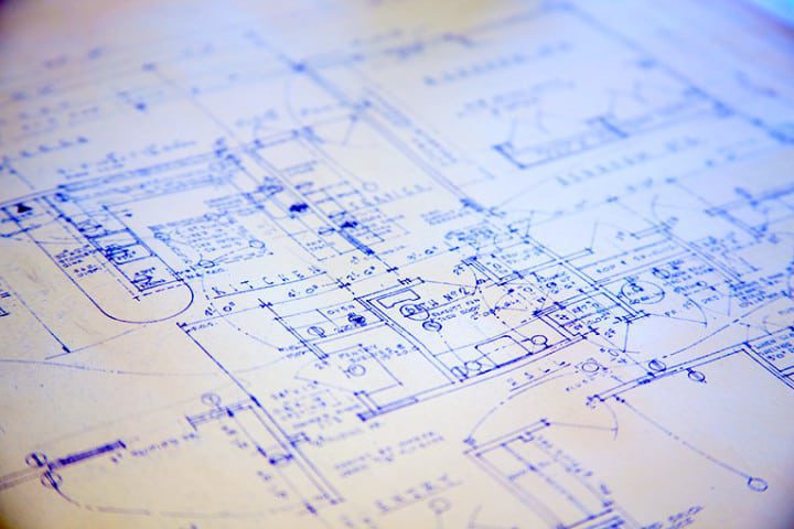 Photograph of a generic architectural blueprint for a building.