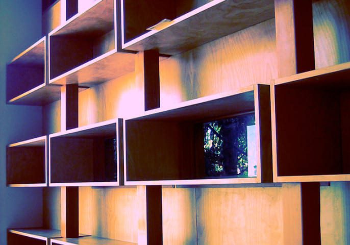 Photograph of empty wooden shelves